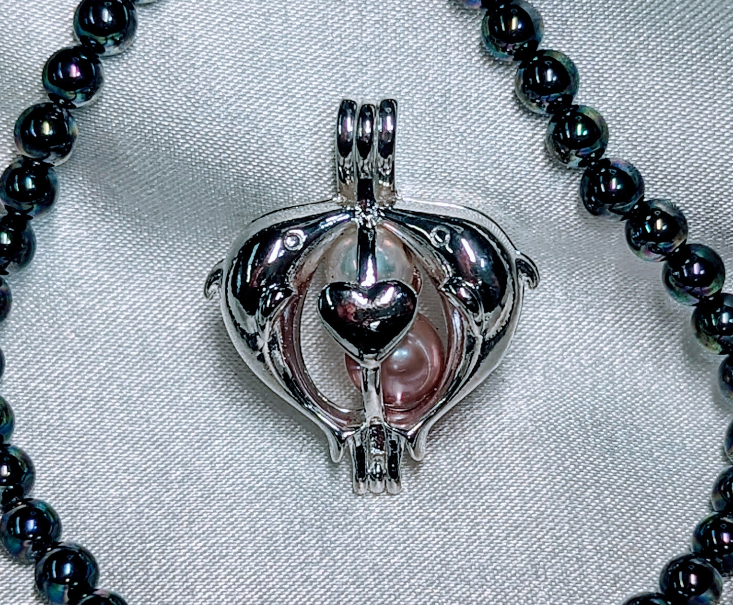 Dolphin_Heart_Cage_pearlenvy